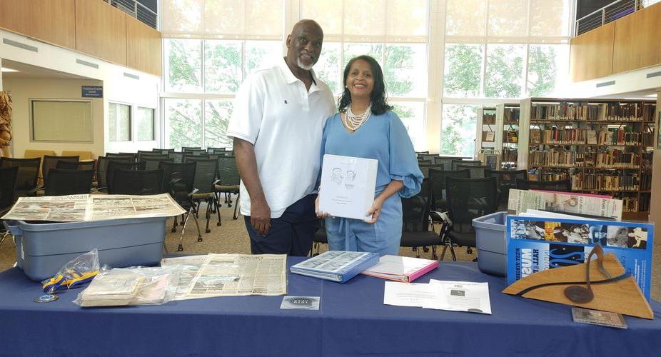 Leontyne ‘Gaye’ Clay Peck and her husband, Lyle, display a few of the items they recently donated to the Mary F. Shipper Library.